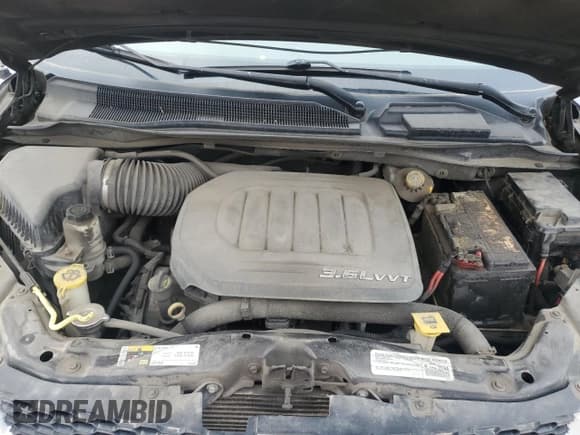 ✅ 2015 Dodge Grand Caravan Crew Plus • VIN: 2C4RDGDG3FR574778 • Lot: 67287425. Wystawiony na Copart z przebiegiem 281 942 mil. Bezpłatny archiwum sprzedaży aukcyjnych z USA i szczegółowy raport historii pojazdu na DreamBid. Zdjęcie 12.