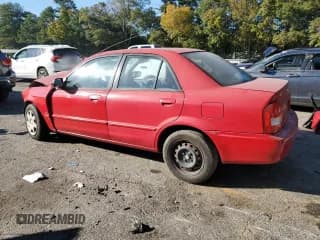 ✅ 1999 Mazda Protege DX • VIN: JM1BJ2223X0115069 • Lot: 77110674. Wystawiony na Copart z przebiegiem 107 185 mil. Bezpłatny archiwum sprzedaży aukcyjnych z USA i szczegółowy raport historii pojazdu na DreamBid. Zdjęcie 2.