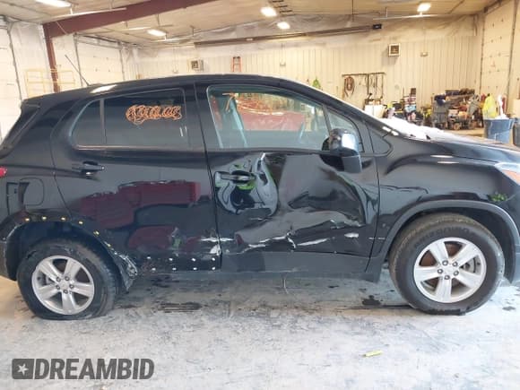 ✅ 2021 Chevrolet Trax LS • VIN: KL7CJNSB9MB349977 • Lot: 41657689. Listed on IAAI with 142,633 mi. Free auction sales archive from the USA and detailed vehicle history report at DreamBid. Image 14.