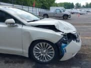 ✅ 2013 Lincoln MKZ • VIN: 3LN6L2G96DR805178 • Lot: 42915934. Wystawiony na IAAI z przebiegiem 158 757 mil. Bezpłatny archiwum sprzedaży aukcyjnych z USA i szczegółowy raport historii pojazdu na DreamBid. Zdjęcie 12.