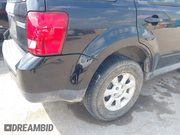 ✅ 2008 Mazda Tribute Grand Touring • VIN: 4F2CZ96168KM01947 • Lot: 43202577. Listed on IAAI with 165,530 mi. Free auction sales archive from the USA and detailed vehicle history report at DreamBid. Image 14.
