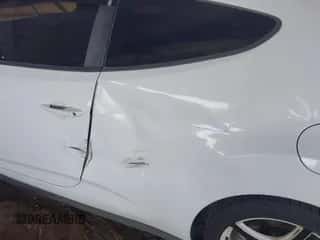 2016 Hyundai Veloster z VIN KMHTC6ADXGU288262, wystawiony jako IAAI lot #43321265 z przebiegiem 126 802 mil mil oraz . Historia ofert i sprzedaży dostępna na DreamBid. Obrazek 6.