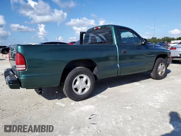 2000 Dodge Dakota с VIN 1B7FL26X0YS599337, выставлен на аукционе Copart как лот 73826624 с пробегом 146 688 миль миль и Списание • Salvage title. История ставок и продаж доступна на DreamBid. Изображение 3.