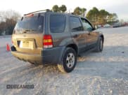 ✅ 2002 Ford Escape XLT Choice • VIN: 1FMYU03112KE00910 • Lot: 43698982. Listed on IAAI with 182,906 mi. Free auction sales archive from the USA and detailed vehicle history report at DreamBid. Image 4.