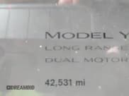 ✅ 2022 Tesla Model Y Long Range • VIN: 7SAYGDEE8NA021164 • Lot: 43483473. Listed on IAAI with 42,531 mi. Free auction sales archive from the USA and detailed vehicle history report at DreamBid. Image 14.