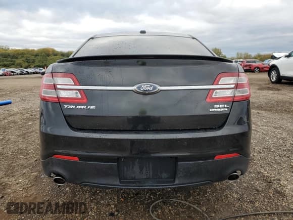 ✅ 2015 Ford Taurus SEL • VIN: 1FAHP2E85FG180106 • Лот: 89679025. Опубликован ранее на Copart с пробегом 128 068 миль. Бесплатный доступ к архиву аукционных продаж из США и подробный отчёт об истории автомобиля на DreamBid. Изображение 6.