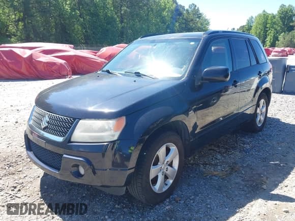 ✅ 2009 Suzuki Grand Vitara • VIN: JS3TE047094100192 • Lot: 42336959. Wystawiony na IAAI z przebiegiem 244 995 mil. Bezpłatny archiwum sprzedaży aukcyjnych z USA i szczegółowy raport historii pojazdu na DreamBid. Zdjęcie 2.