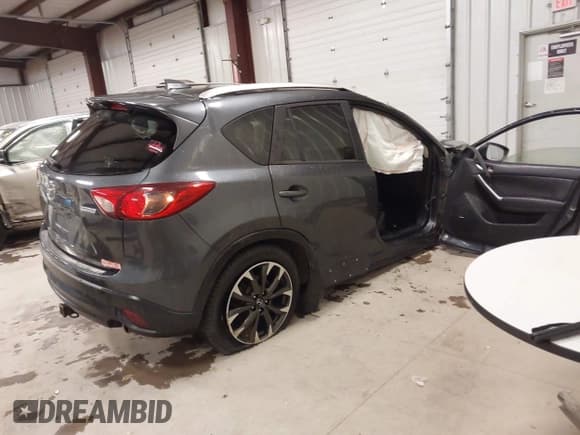 ✅ 2016 Mazda CX-5 Grand Touring • VIN: JM3KE4DY4G0679077 • Lot: 43560857. Wystawiony na IAAI z przebiegiem 83 348 mil. Bezpłatny archiwum sprzedaży aukcyjnych z USA i szczegółowy raport historii pojazdu na DreamBid. Zdjęcie 4.