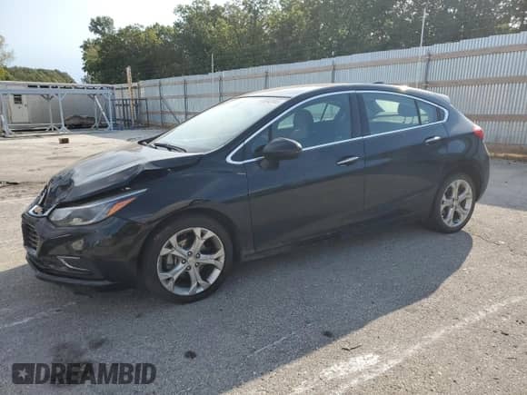 2018 Chevrolet Cruze Premier z VIN 3G1BF6SM1JS615198, wystawiony jako Copart lot #85842965 z przebiegiem 94 370 mil mil oraz Szkoda całkowita • Salvage title. Historia ofert i sprzedaży dostępna na DreamBid. Obrazek 1.