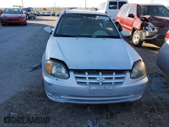 2005 Hyundai Accent GLS с VIN KMHCG35C15U325989, выставлен на аукционе Copart как лот 80578244 с пробегом 190 860 миль миль и Чистый • Clean title. История ставок и продаж доступна на DreamBid. Изображение 5.