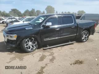 2019 Ram 1500 Limited z VIN 1C6SRFHT4KN870640, wystawiony jako Copart lot #71703805 z przebiegiem 97 596 mil mil oraz Szkoda całkowita • Salvage title. Historia ofert i sprzedaży dostępna na DreamBid. Obrazek 1.