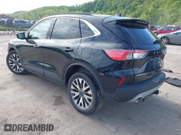 ✅ 2020 Ford Escape Titanium • VIN: 1FMCU9J96LUA72557 • Lot: 42204154. Listed on IAAI with 100 mi. Free auction sales archive from the USA and detailed vehicle history report at DreamBid. Image 3.