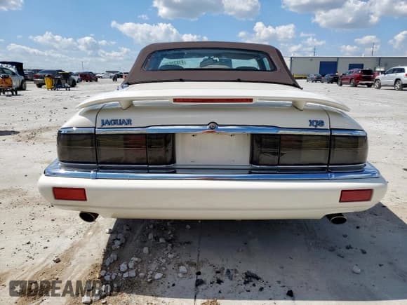 ✅ 1995 Jaguar XJS • VIN: SAJNX2743SC197920 • Лот: 81832075. Опубликован ранее на Copart с пробегом 97 510 миль. Бесплатный доступ к архиву аукционных продаж из США и подробный отчёт об истории автомобиля на DreamBid. Изображение 6.