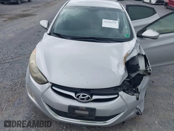 ✅ 2013 Hyundai Elantra GLS • VIN: KMHDH4AE8DU829579 • Lot: 42940329. Listed on IAAI with 153,115 mi. Free auction sales archive from the USA and detailed vehicle history report at DreamBid. Image 6.