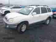 ✅ 2002 Hyundai Santa Fe • VIN: KM8SB12B52U203836 • Лот: 41828522. Размещён на IAAI с пробегом 186 315 миль миль. Получите бесплатный доступ к архиву аукционных продаж из США и посмотрите подробный отчёт об истории автомобиля на DreamBid. Изображение 2.