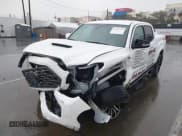 ✅ 2022 Toyota Tacoma TRD Off Road • VIN: 3TMCZ5AN1NM509349 • Lot: 43757147. Listed on IAAI with 24,320 mi. Free auction sales archive from the USA and detailed vehicle history report at DreamBid. Image 2.