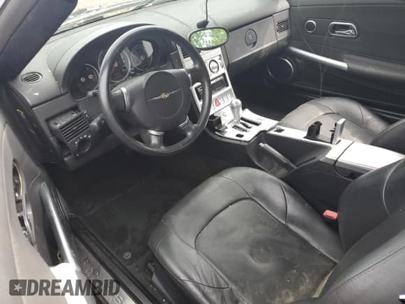 ✅ 2004 Chrysler Crossfire • VIN: 1C3AN69L54X014337 • Lot: 64790664. Listed on Copart with 121,344 mi. Free auction sales archive from the USA and detailed vehicle history report at DreamBid. Image 8.