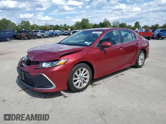 2021 Toyota Camry LE with VIN 4T1C11BK0MU023660, listed as a Copart auction lot 70505895 with 54,746 mi miles and Salvage title. Bid and sale history available at DreamBid. Image 1.