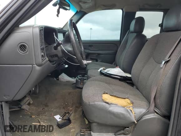 2005 Chevrolet Silverado 1500 Z71 z VIN 2GCEK19B351321259, wystawiony jako Copart lot #72497374 z przebiegiem 242 688 mil mil oraz Szkoda całkowita • Salvage title. Historia ofert i sprzedaży dostępna na DreamBid. Obrazek 7.