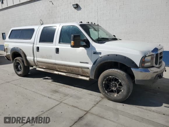 ✅ 1999 Ford F-350 XL • VIN: 1FTSW31F2XEE68448 • Lot: 80073635. Listed on Copart with 330,887 mi. Free auction sales archive from the USA and detailed vehicle history report at DreamBid. Image 4.