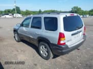 ✅ 2003 Mazda Tribute ES • VIN: 4F2CZ96123KM35666 • Lot: 42504796. Wystawiony na IAAI z przebiegiem 152 744 mil. Bezpłatny archiwum sprzedaży aukcyjnych z USA i szczegółowy raport historii pojazdu na DreamBid. Zdjęcie 3.