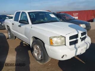 ✅ 2006 Dodge Dakota SLT • VIN: 1D7HE48K66S556852 • Лот: 42499533. Опубликован ранее на IAAI с пробегом 204 503 миль. Бесплатный доступ к архиву аукционных продаж из США и подробный отчёт об истории автомобиля на DreamBid. Изображение 1.