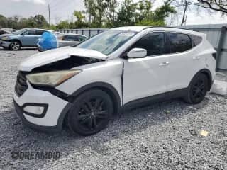 2013 Hyundai Santa Fe Sport z VIN 5XYZU3LAXDG058456, wystawiony jako Copart lot #84437475 z przebiegiem 200 000 mil mil oraz Szkoda całkowita • Salvage title. Historia ofert i sprzedaży dostępna na DreamBid. Obrazek 1.