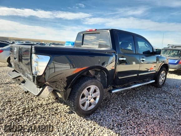 ✅ 2010 Nissan Titan LE • VIN: 1N6BA0EC6AN318344 • Lot: 91043965. Wystawiony na Copart z przebiegiem 156 749 mil. Bezpłatny archiwum sprzedaży aukcyjnych z USA i szczegółowy raport historii pojazdu na DreamBid. Zdjęcie 3.