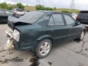 ✅ 1999 Mazda Protege ES • VIN: JM1BJ2210X0150711 • Lot: 57629144. Wystawiony na Copart z przebiegiem 175 754 mil. Bezpłatny archiwum sprzedaży aukcyjnych z USA i szczegółowy raport historii pojazdu na DreamBid. Zdjęcie 3.
