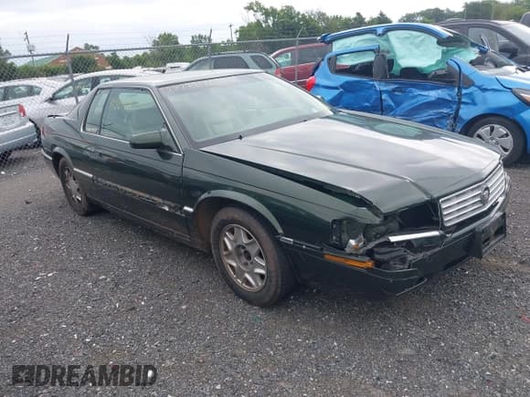 ✅ 2001 Cadillac Eldorado ESC • VIN: 1G6EL12Y01B107760 • Lot: 42797121. Wystawiony na IAAI z przebiegiem 86 446 mil. Bezpłatny archiwum sprzedaży aukcyjnych z USA i szczegółowy raport historii pojazdu na DreamBid. Zdjęcie 1.