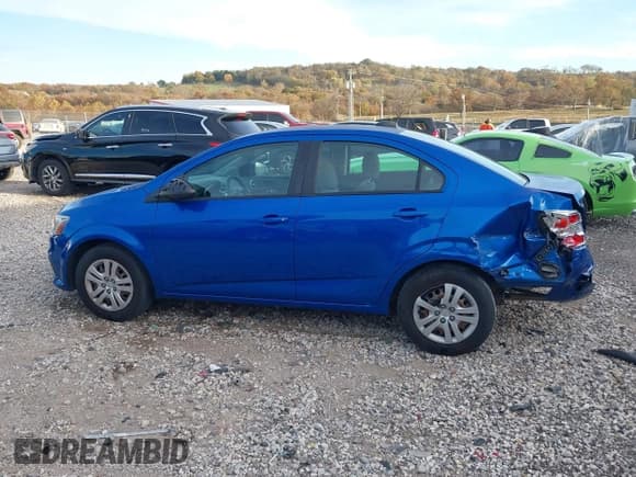 ✅ 2017 Chevrolet Sonic LS • VIN: 1G1JB5SH5H4151055 • Lot: 43635264. Listed on IAAI with 91,397 mi. Free auction sales archive from the USA and detailed vehicle history report at DreamBid. Image 14.