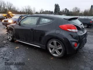✅ 2015 Hyundai Veloster Turbo • VIN: KMHTC6AE1FU237546 • Lot: 84928164. Wystawiony na Copart z przebiegiem 83 372 mil. Bezpłatny archiwum sprzedaży aukcyjnych z USA i szczegółowy raport historii pojazdu na DreamBid. Zdjęcie 2.