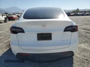 ✅ 2023 Tesla Model Y Long Range • VIN: 7SAYGDEE0PA110021 • Lot: 80511615. Wystawiony na Copart z przebiegiem 55 135 mil. Bezpłatny archiwum sprzedaży aukcyjnych z USA i szczegółowy raport historii pojazdu na DreamBid. Zdjęcie 6.