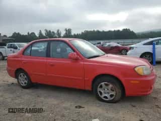 2005 Hyundai Accent GLS z VIN KMHCG45C15U652785, wystawiony jako Copart lot #65780725 z przebiegiem 167 670 mil mil oraz Czysty tytuł • Clean title. Historia ofert i sprzedaży dostępna na DreamBid. Obrazek 4.