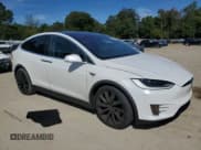 ✅ 2019 Tesla Model X 75D • VIN: 5YJXCAE24KF151420 • Lot: 82215815. Listed on Copart with 99,594 mi. Free auction sales archive from the USA and detailed vehicle history report at DreamBid. Image 4.