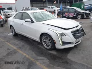 ✅ 2015 Cadillac CTS Luxury RWD • VIN: 1G6AR5SX2F0143450 • Lot: 41408331. Listed on IAAI with 202,233 mi. Free auction sales archive from the USA and detailed vehicle history report at DreamBid. Image 1.