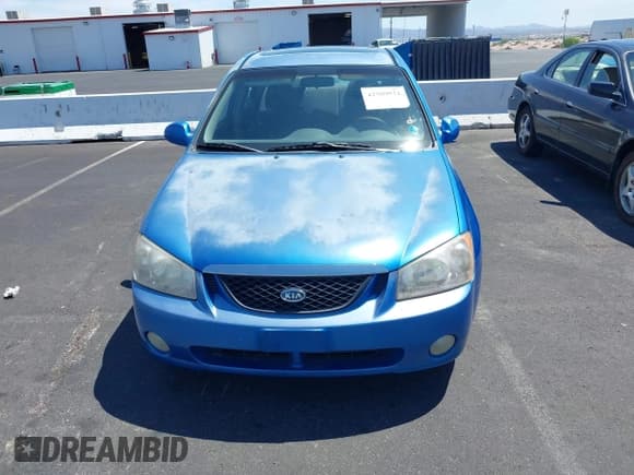 ✅ 2005 Kia Spectra LX • VIN: KNAFE121855155765 • Lot: 42509011. Listed on IAAI with 99,818 mi. Free auction sales archive from the USA and detailed vehicle history report at DreamBid. Image 12.