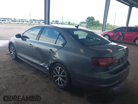 ✅ 2017 Volkswagen Jetta SE • VIN: 3VWDB7AJ5HM309013 • Лот: 42794702. Опубликован ранее на IAAI с пробегом 82 094 миль. Бесплатный доступ к архиву аукционных продаж из США и подробный отчёт об истории автомобиля на DreamBid. Изображение 3.