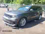 2021 Dodge Durango R/T with VIN 1C4SDJCT4MC764432, listed as a IAAI auction lot 42448672 with 48,756 mi miles and . Bid and sale history available at DreamBid. Image 2.