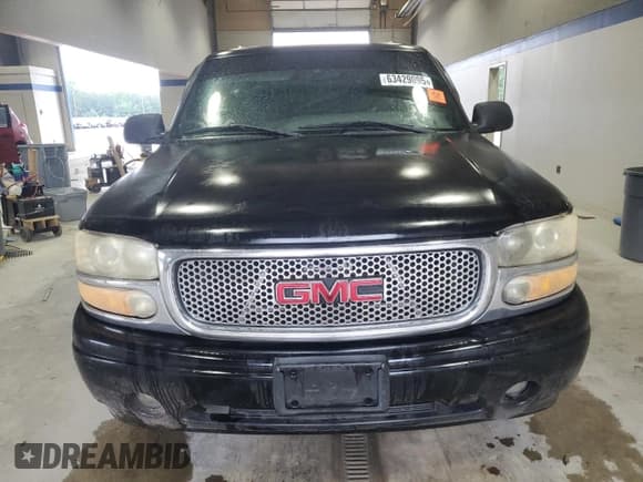 ✅ 2001 GMC Yukon Denali • VIN: 1GKEK63U41J220047 • Lot: 63429095. Wystawiony na Copart z przebiegiem Nie podano. Bezpłatny archiwum sprzedaży aukcyjnych z USA i szczegółowy raport historii pojazdu na DreamBid. Zdjęcie 5.