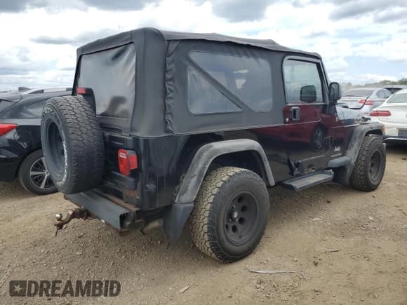 ✅ 2005 Jeep Wrangler Unlimited • VIN: 1J4FA44S25P335120 • Lot: 70306025. Listed on Copart with 137,315 mi. Free auction sales archive from the USA and detailed vehicle history report at DreamBid. Image 3.