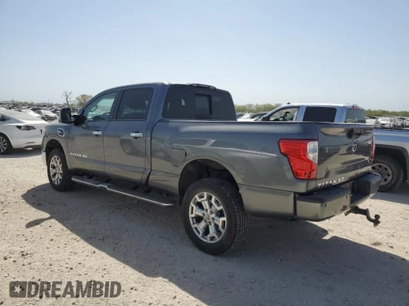 ✅ 2017 Nissan Titan SV • VIN: 1N6AA1F25HN556025 • Лот: 50098995. Опубликован ранее на Copart с пробегом 161 927 миль. Бесплатный доступ к архиву аукционных продаж из США и подробный отчёт об истории автомобиля на DreamBid. Изображение 2.