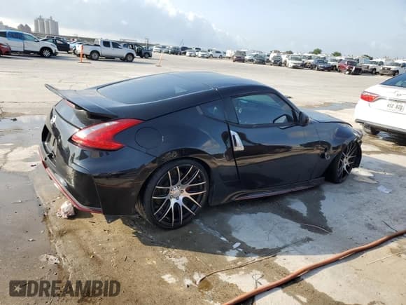 ✅ 2015 Nissan 370Z • VIN: JN1AZ4EH7FM444335 • Лот: 57631935. Опубликован ранее на Copart с пробегом 50 096 миль. Бесплатный доступ к архиву аукционных продаж из США и подробный отчёт об истории автомобиля на DreamBid. Изображение 3.
