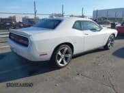 ✅ 2018 Dodge Challenger SXT Plus • VIN: 2C3CDZAG0JH219995 • Lot: 43752117. Listed on IAAI with 110,106 mi. Free auction sales archive from the USA and detailed vehicle history report at DreamBid. Image 4.