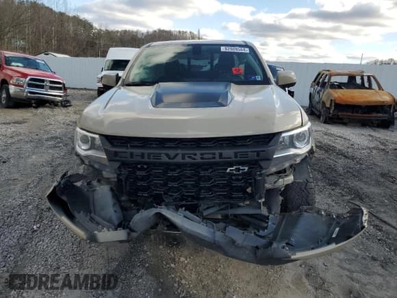 ✅ 2021 Chevrolet Colorado 4WD ZR2 • VIN: 1GCRTEEN2M1187631 • Лот: 82909564. Опубликован ранее на Copart с пробегом 52 950 миль. Бесплатный доступ к архиву аукционных продаж из США и подробный отчёт об истории автомобиля на DreamBid. Изображение 5.