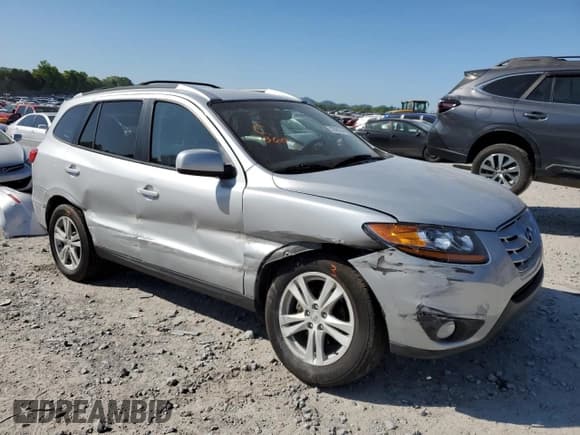 ✅ 2010 Hyundai Santa Fe SE • VIN: 5NMSH4AG3AH395250 • Lot: 71778504. Listed on Copart with 199,311 mi. Free auction sales archive from the USA and detailed vehicle history report at DreamBid. Image 4.