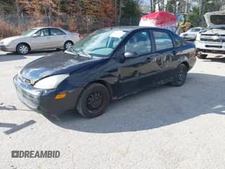 ✅ 2003 Ford Focus LX • VIN: 1FAFP33P53W180521 • Lot: 43639979. Wystawiony na IAAI z przebiegiem 102 163 mil. Bezpłatny archiwum sprzedaży aukcyjnych z USA i szczegółowy raport historii pojazdu na DreamBid. Zdjęcie 2.