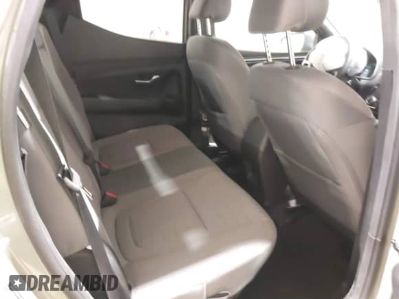 2024 Hyundai Santa Cruz SE with VIN 5NTJADDE7RH108941, listed as a IAAI auction lot 40990254 with 7,461 mi miles and . Bid and sale history available at DreamBid. Image 8.