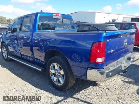 ✅ 2015 Ram 1500 SLT • VIN: 1C6RR6GG4FS615061 • Lot: 43480414. Listed on IAAI with 117,255 mi. Free auction sales archive from the USA and detailed vehicle history report at DreamBid. Image 3.