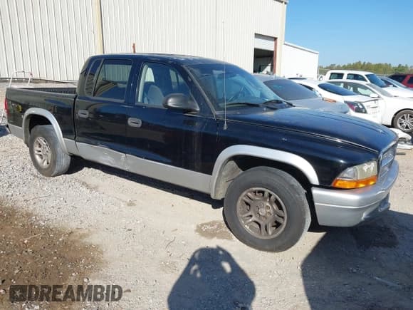 ✅ 2003 Dodge Dakota SLT • VIN: 1D7HL48X93S151422 • Lot: 40661577. Wystawiony na IAAI z przebiegiem 238 586 mil. Bezpłatny archiwum sprzedaży aukcyjnych z USA i szczegółowy raport historii pojazdu na DreamBid. Zdjęcie 1.